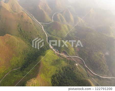 Drone aerial view of landscape fog over mountains in sunrise sky,High angle view over countryside at northern Vietnam,Wide angle view 122791200