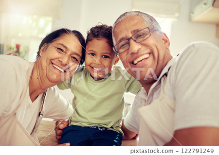 Grandparents, grandkid and family smile, happy and playing together at home. Portrait face of love, bond and relaxing elderly grandma, grandpa and young kid for funny, care and childhood development Grandparents, grandkid and family smile, happy and playing together at home. Portrait face of love, bond and relaxing elderly grandma, grandpa and young kid for funny, care and childhood development 122791249