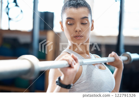 Workout, fitness and exercise woman with barbell in gym for health, cardio and wellness. Healthy, strength and sports bodybuilder or athlete training for weight lifting and muscle power competition. 122791326