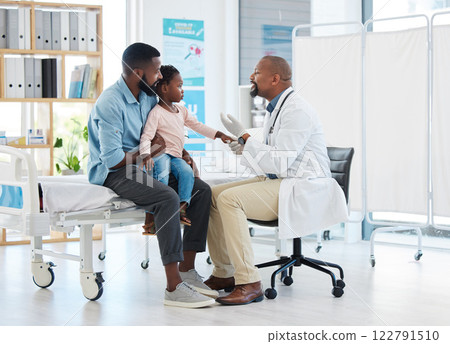 Pediatrician doctor consulting black kid patient for healthcare service, medical help and wellness check in hospital clinic. Friendly, trust and kind african family gp expert for healthy child advice 122791510
