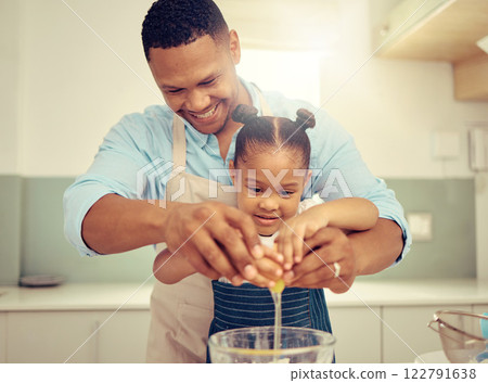 Happy black father and daughter baking in a kitchen, having fun being playful and bonding. Caring parent teaching child cooking and domestic skills, prepare a healthy, tasty snack or meal together Happy black father and daughter baking in a kitchen, having fun being playful and bonding. Caring parent teaching child cooking and domestic skills, prepare a healthy, tasty snack or meal together 122791638