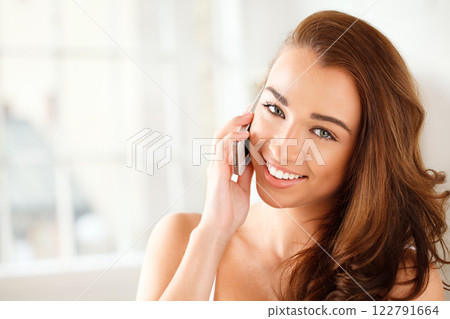 Mobile communication, contact and phone call of a happy woman at home with mockup. Portrait of a young natural beauty using technology to connect with people in a apartment or house with mock up Mobile communication, contact and phone call of a happy woman at home with mockup. Portrait of a young natural beauty using technology to connect with people in a apartment or house with mock up 122791664