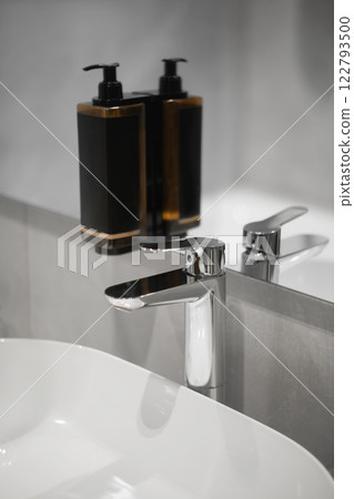 Modern white sink and faucet, bathroom Modern white sink and faucet, bathroom 122793500