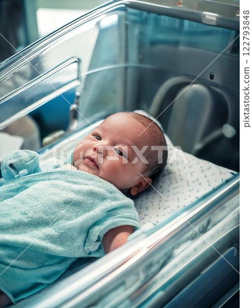 Smiling baby in a hospital bed AI-generated image 122793848
