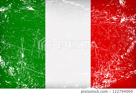 A weathered Italian flag with green white and red stripes showing signs of wear and tear symbolizing history and resilience 122794009