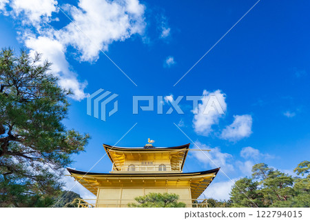 Kyoto City: Rokuon-ji Temple (Kinkaku-ji Temple) shining against the blue winter sky 122794015