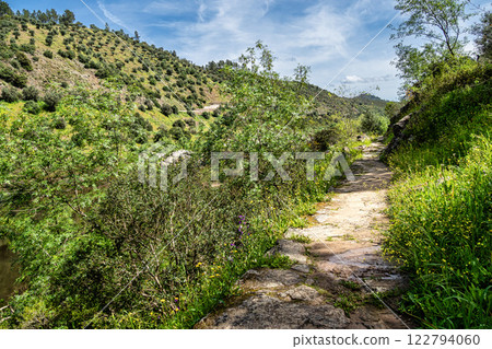 Walking along the Barca da Amieira walkways in Amieira do Tejo, Portugal. 122794060