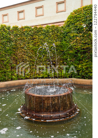 Water fountain Prague park at decorative sculpture. Wallenstein palace and gardens in Mala Strana, Prague, Czech Republic 122794440