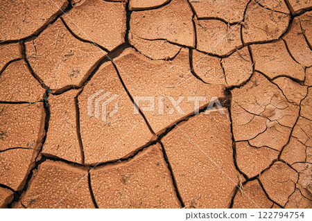 Cracked earth in desert. Takir soil. Landform, cracks pattern. Water crisis 122794754