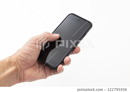 Male hand holding a smartphone Male hand holding a smartphone 122795936