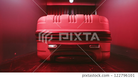 Red Light Alert About Detected Suspicious Item During Luggage Scanning Procedure in X-ray Scanner Red Light Alert About Detected Suspicious Item During Luggage Scanning Procedure in X-ray Scanner 122796101