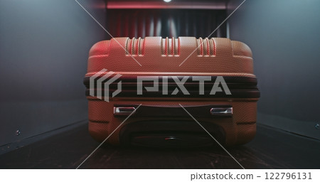 Red Light Alert About Detected Suspicious Item During Luggage Scanning Procedure Red Light Alert About Detected Suspicious Item During Luggage Scanning Procedure 122796131