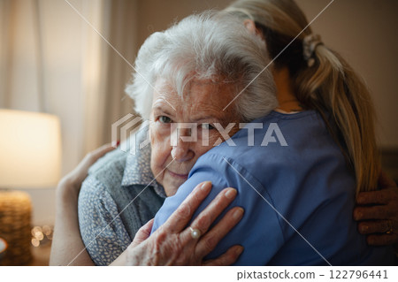 Psychologist provides mental health support and grief counseling to elderly patient. 122796441