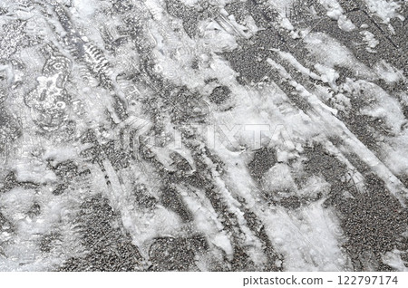 Road covered with slush-like snow Road covered with slush-like snow 122797174