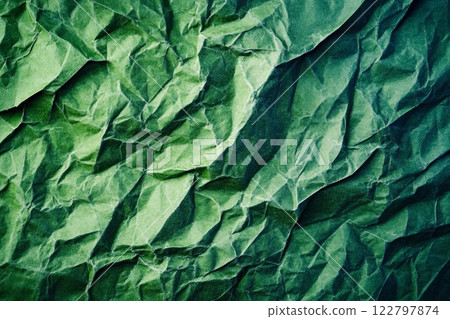 Crumpled green paper texture in dim lighting. Neural network AI generated 122797874