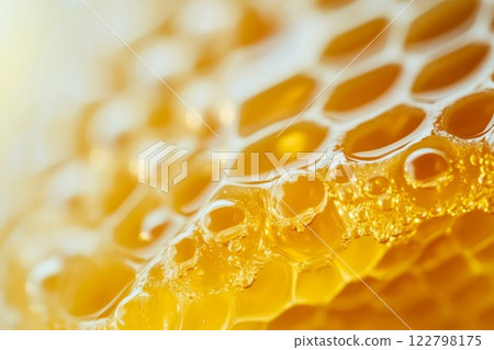 Golden honeycomb macro with warm lighting. Neural network AI generated 122798175
