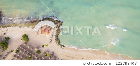 Birds eye view of a Bayahibe beach with parasol and lighthouse in the Dominican Republic 122798408