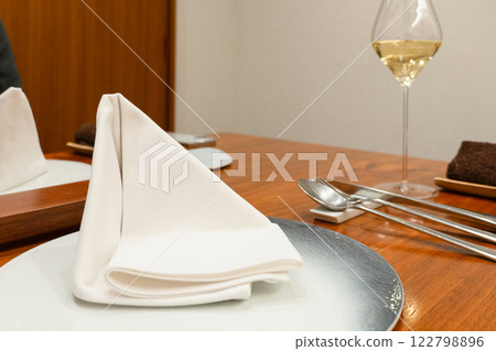 Table manners napkins cutlery 122798896