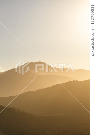 mountains silhouettes in sunset light, banner 122799031