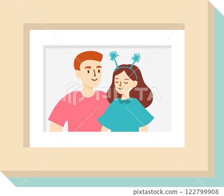Smiling couple enjoying a joyful moment, with the woman wearing a whimsical headband featuring playful antennas, beautifully framed in a light brown frame with passepartout 122799908