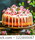 Baked sponge cake decorated with flowers, festive spring baking. 122800087