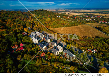 Small town with residential buildings in eco friendly suburban neighborhood Small town with residential buildings in eco friendly suburban neighborhood 122800752