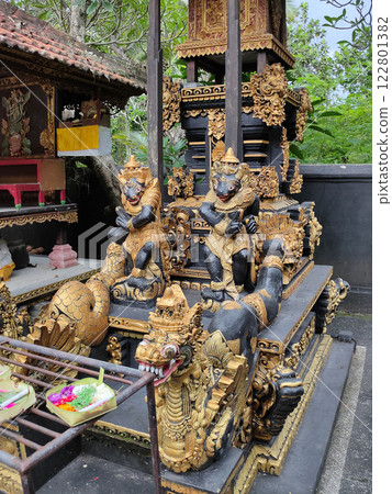 Traditional statue of a guardian demon on the island of Bali, Indonesia. Traditional statue of a guardian demon on the island of Bali, Indonesia. 122801382