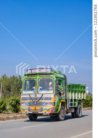 India_Colorful trucks running through the city India_Colorful trucks running through the city 122802768