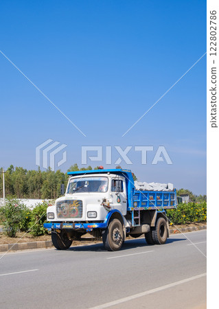 India_Colorful trucks running through the city 122802786