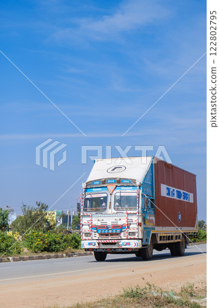 India_Colorful trucks running through the city 122802795