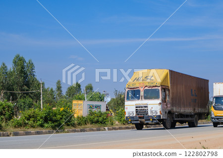 India_Colorful trucks running through the city 122802798