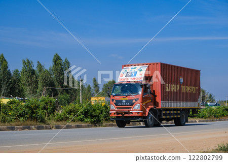India_Colorful trucks running through the city 122802799