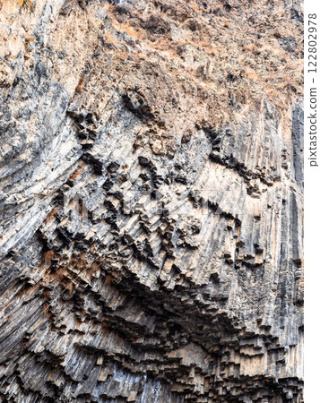 surface of wall in Garni Gorge from basalt columns 122802978