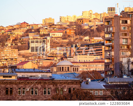 apartment buildings lit by setting sun in Yerevan apartment buildings lit by setting sun in Yerevan 122803084