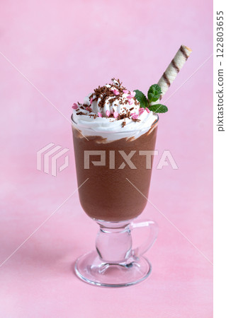 Milk chocolate drink with whipped cream. Milk chocolate drink with whipped cream. 122803655