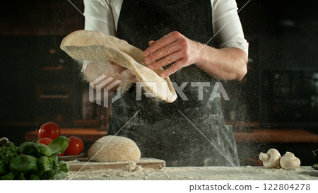 Freeze Motion of Chef Making Yeast Dough . Closeup of Bread or Pizza Dough Preparation 122804278