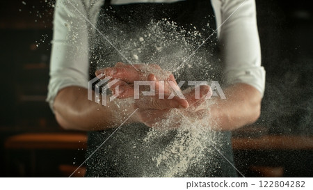 Freeze Motion Chef Clapping Hands with Flour . Closeup of Bread or Pizza Dough Preparation Freeze Motion Chef Clapping Hands with Flour . Closeup of Bread or Pizza Dough Preparation 122804282