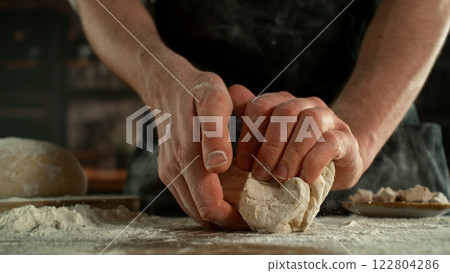 Freeze Motion of Chef Making Yeast Dough . Closeup of Bread or Pizza Dough Preparation 122804286