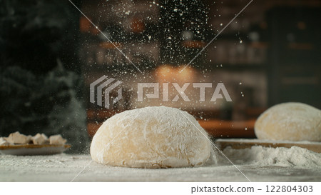 Freeze Motion of Falling Yeast Dough into Flour . Closeup of Bread or Pizza Dough Preparation Freeze Motion of Falling Yeast Dough into Flour . Closeup of Bread or Pizza Dough Preparation 122804303