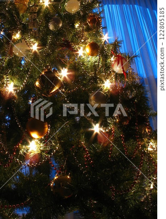 Christmas Tree Decorated with Ornaments and Lights 122805185