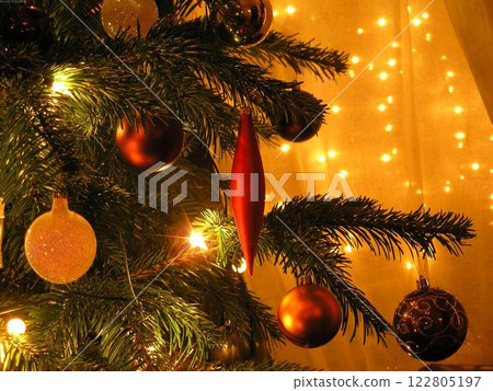 Christmas Tree with Ornaments and Decorative Lights 122805197