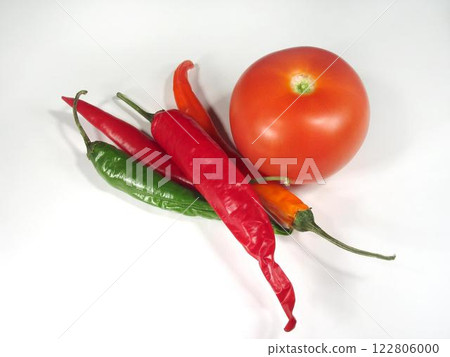 Vibrant Mix of Fresh Ingredients: Bird's Eye Chili, Plum Tomato, and Cayenne Pepper Vibrant Mix of Fresh Ingredients: Bird's Eye Chili, Plum Tomato, and Cayenne Pepper 122806000