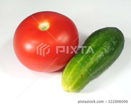 Fresh Plump Plum Tomatoes Among Vibrant Green Plants in a Natural Food Setting 122806006