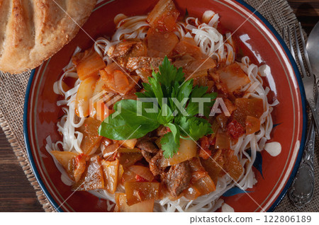 Uighur lagman with parsley and basil. Uighur lagman with parsley and basil. 122806189