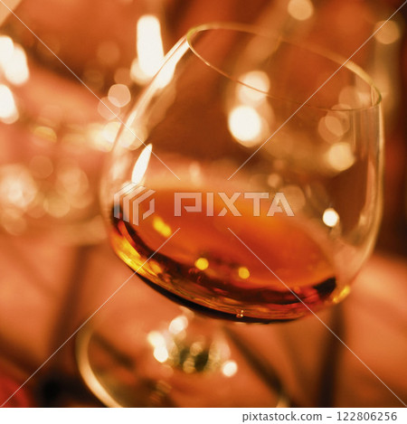 Cognac in a glass close view background Cognac in a glass close view background 122806256
