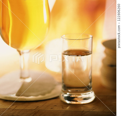 Schnapps Bottle with Glinting Light, Food Photography Schnapps Bottle with Glinting Light, Food Photography 122806260
