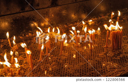 Burning church candles closeup Burning church candles closeup 122806566