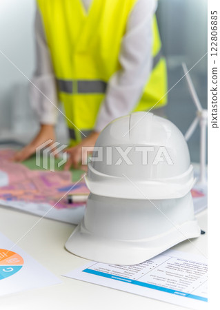 Protective cap on the table with wind turbine mock ups 122806885