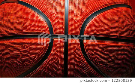 Basketball texture macro photography - Dynamic texture of sports equipment and black lines Basketball texture macro photography - Dynamic texture of sports equipment and black lines 122808129