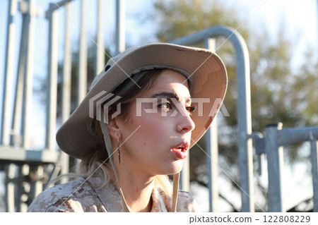 Woman Sit On A Bench During A Mission Woman Sit On A Bench During A Mission 122808229